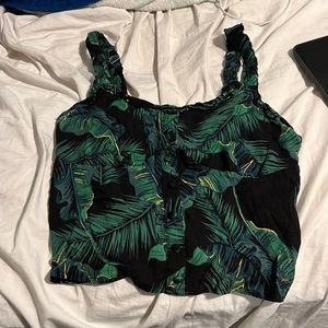 Guess tank top has stretchy straps and starchy back